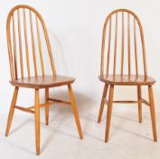 TWO MID 20TH CENTURY BEECH KITCHEN CHAIRS - MANNER OF ERCOL