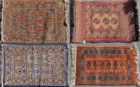 COLLECTION OF FOUR PERSIAN ISLAMIC CARPET FLOOR RUGS