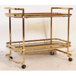 HOLLYWOOD REGENCY - BRASS AND GLASS SERVING TROLLEY