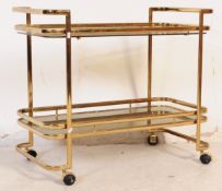 HOLLYWOOD REGENCY - BRASS AND GLASS SERVING TROLLEY