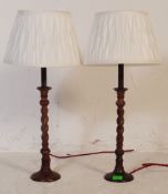 PAIR OF EARLY 20TH CENTURY CAST METAL BARLEY TWIST LAMPS