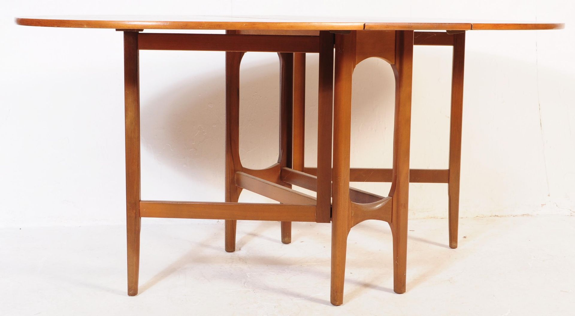 MID 20TH CENTURY RETRO NATHAN DROP LEAF DINING TABLE