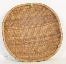 LARGE VINTAGE 20TH CENTURY CIRCULAR ROUND WICKER BASKET.