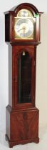 AN OAK TEMPUS FUGIT LONGCASE GRANDFATHER CLOCK