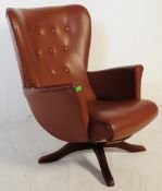 MANNER OF G-PLAN BAT WING FAUX LEATHER SWIVEL CHAIR