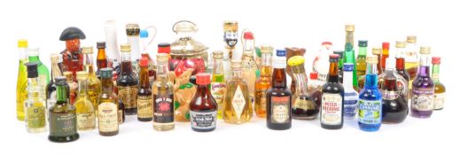 COLLECTION OF MINIATURE SOUVENIR ALCOHOL BOTTLES