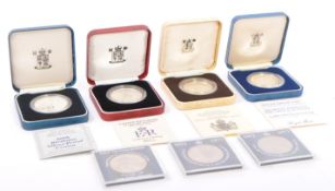 COLLECTION OF ROYAL FAMILY COMMEMORATIVE CASED COINS