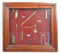 COLLECTION OF CASED MILITARY BRASS TRENCH ART EXAMPLES