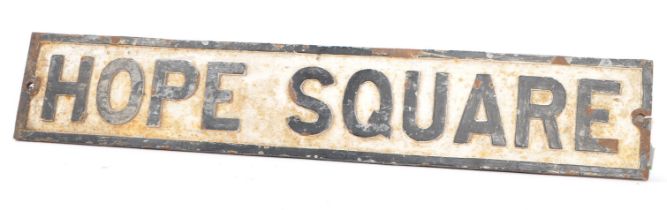 AN EARLY 20TH CENTURY CAST IRON 'HOPE SQUARE' ROAD STREET SIGN