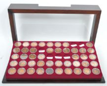 A CASED COLLECTION OF VICTORIAN BRITANNIA COPPER PENNY COINS