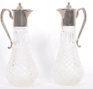 PAIR OF EARLY 20TH CENTURY SILVER PLATED GLASS CLARET JUGS