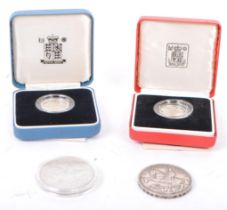 COLLECTION OF FOUR COINS, SILVER ONE POUND & SILVER CROWNS