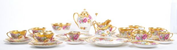 ENGLISH ROSE PATTERN TEA SERVICE IN THE MANNER OF ROYAL CHELSEA