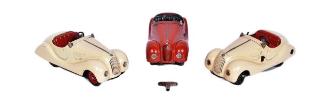 SCHUCO - COLLECTION OF THREE EXAMICO 4001 CLOCKWORK TINPLATE CARS