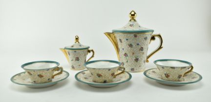 EARLY 20TH CENTURY FRENCH TEA SERVICE WITH GILT PATTERN