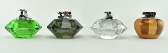 COLLECTION OF FOUR VINTAGE GLASS CIGARETTE LIGHTERS