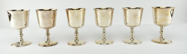 COLLECTION OF SIX MID CENTURY SILVER PLATE TROPHY CUPS