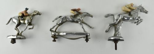 COLLECTION OF THREE COLD PAINTED HORSE CAR MASCOTS