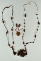TWO JAPANESE COQUILLA NECKLACES & A COQUILLA NUT PEAR