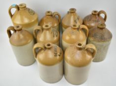 COLLECTION OF TEN EARLY 20TH CENTURY STONEWARE FLAGONS