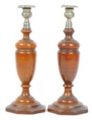 PAIR OF EARLY 20TH CENTURY WOOD & SILVER PLATE CANDLESTICKS