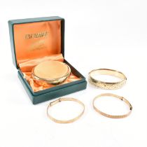 FOUR VINTAGE ROLLED GOLD METAL CORE BANGLES