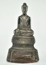 20TH CENTURY METAL COVERED TERRACOTTA SEATED BUDDHA