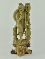 CHINESE CARVED SOAPSTONE FIGURE OF A FISHERMAN