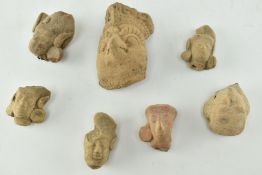 SEVEN LOOSE INDUS VALLEY TERRACOTTA HEADS