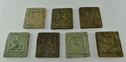 SEVEN CHINESE 19TH CENTURY AND LATER EMBOSSED TILES