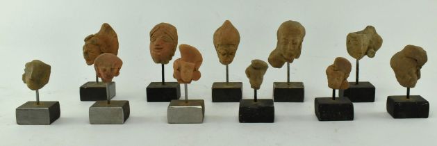 COLLECTION OF 11 PIECES OF INDUS VALLEY TERRACOTTA HEADS