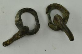 TWO ANCIENT ROMAN OR LATER BRONZE BUCKLES