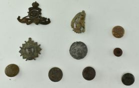 GROUP OF MILITARY BADGES AND BUTTONS