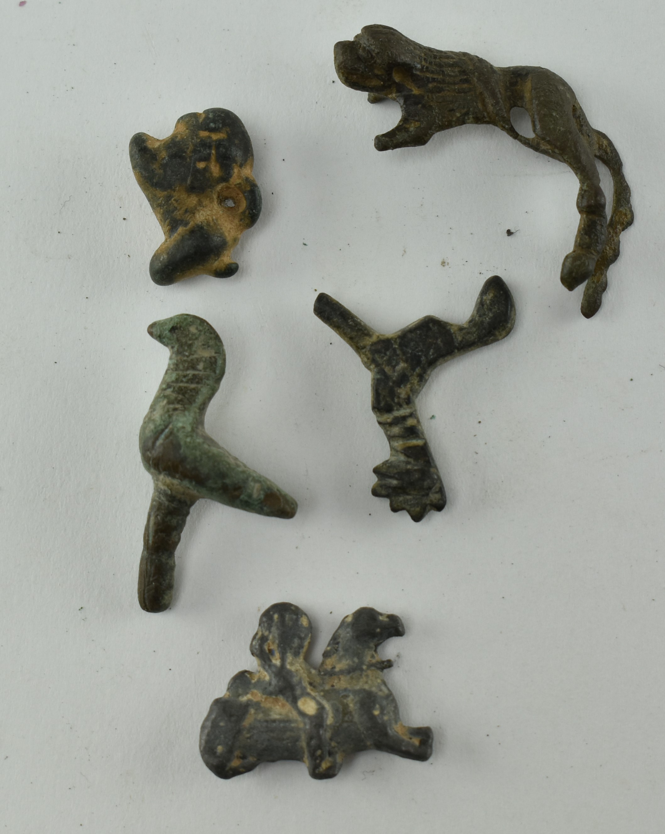 FIVE PIECES OF ANCIENT ROMAN BRONZE ANIMAL BROOCHES