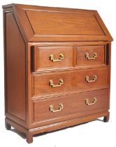 GEORGE ZEE & CO - 20TH CENTURY CARVED HARDWOOD BUREAU DESK