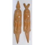 PAIR OF 20TH CENTURY CARVED TRIBAL WALL HANGING MASKS