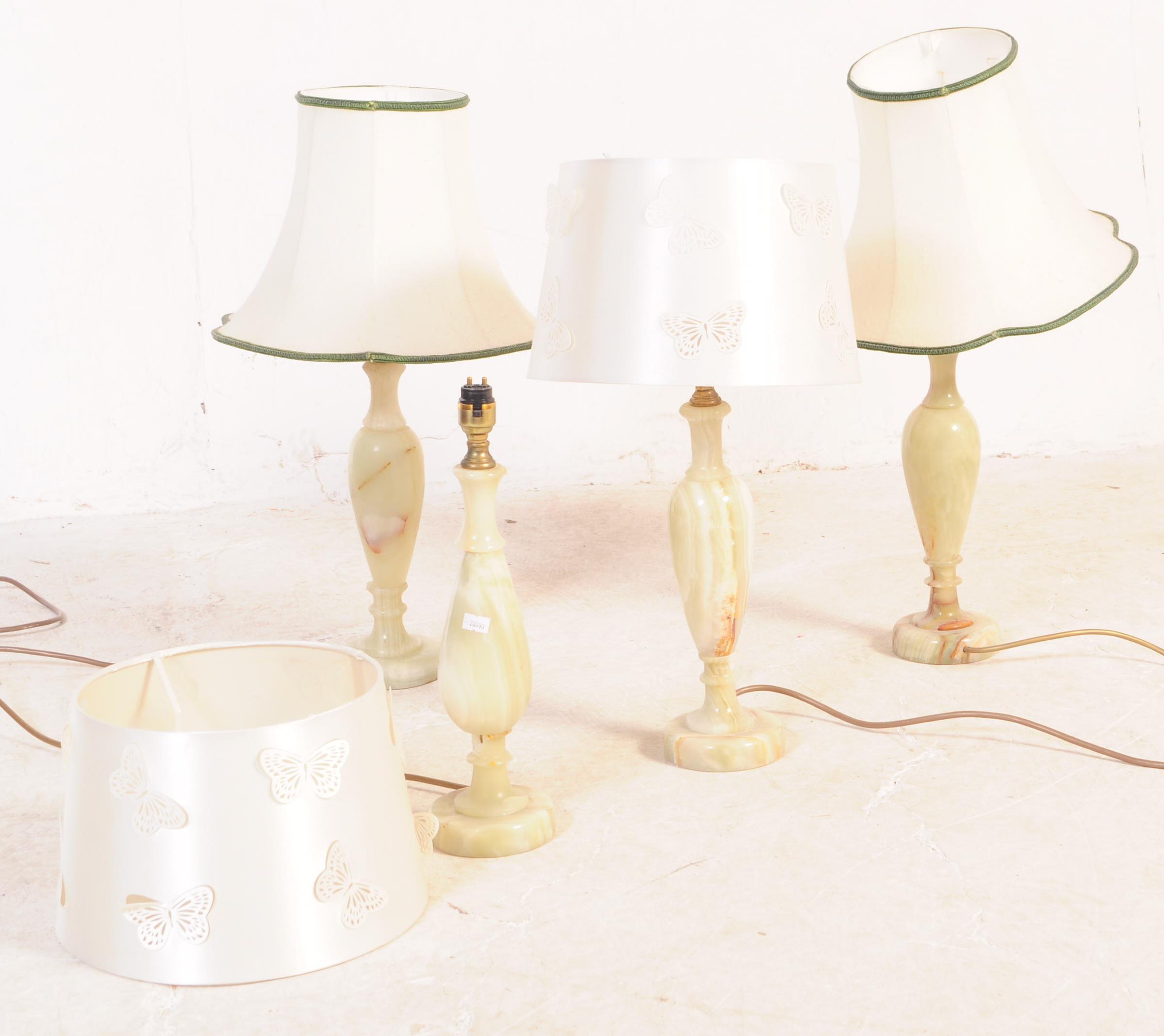 SET OF FOUR MID 20TH CENTURY ONYX TABLE LAMPS