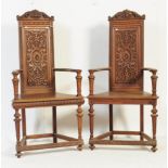 PAIR OF 19TH CENTURY OAK FRENCH CARVED CONVERSATION CHAIRS