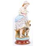 PORCELAIN FIGURINE OF LADY WITH GOAT IN THE STYLE OF CAPODIMONTE