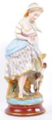 PORCELAIN FIGURINE OF LADY WITH GOAT IN THE STYLE OF CAPODIMONTE