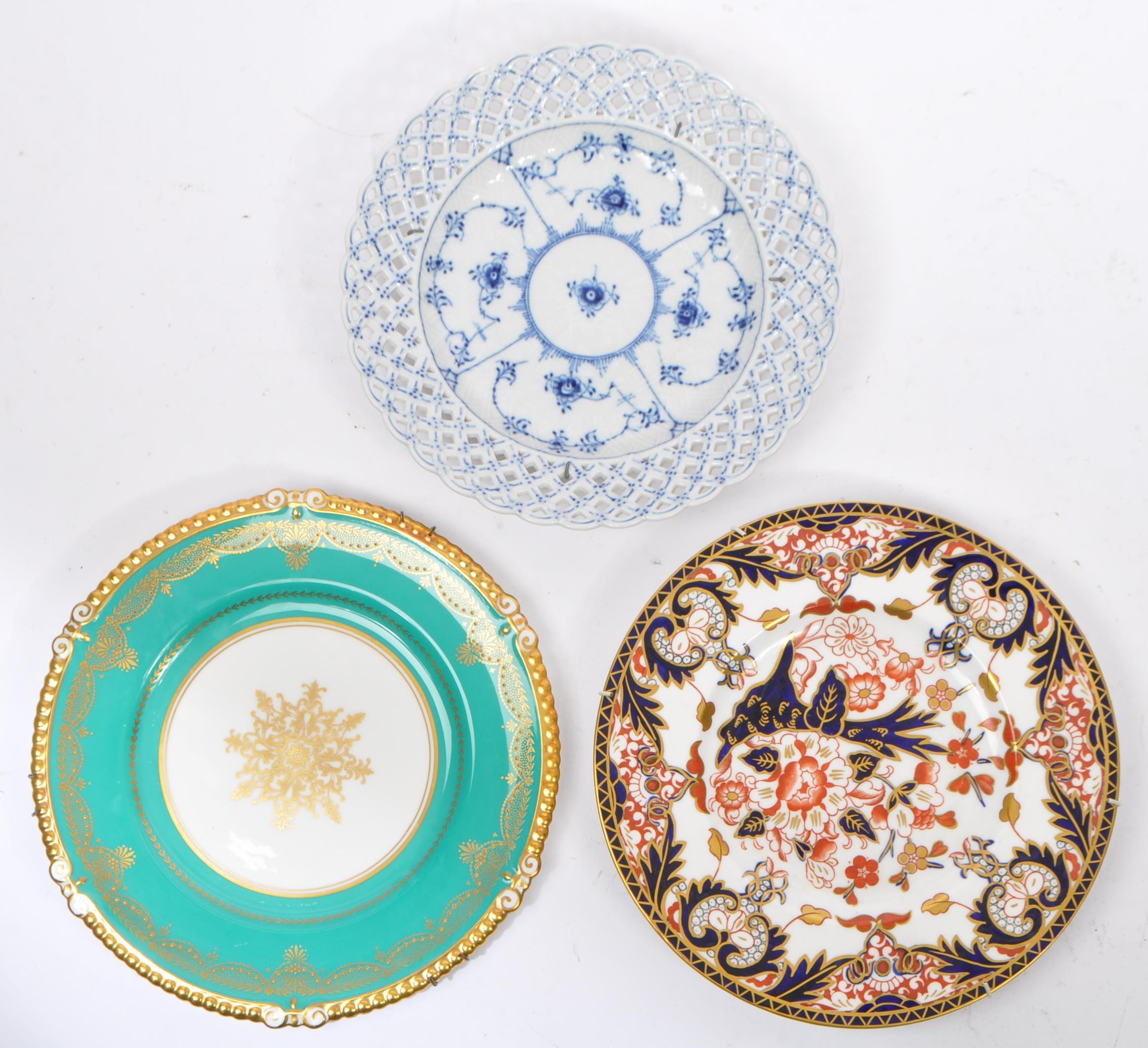 COLLECTION OF THREE CHINA CABINET PLATES
