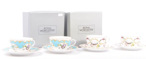 TWO ROYAL WORCESTER FOXGLOVE / PRIMULA CUPS AND SAUCERS BOXED