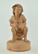 20TH CENTURY TERRACOTTA EUROPEAN FIGURINE OF A BOY