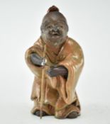 20TH CENTURY MAN FIGURINE WITH WALKING STICK