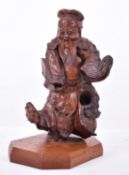 A 20TH CENTURY CHINESE HAND CARVED DEITY OF PROSPERITY