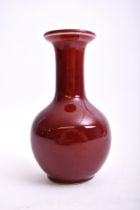 A 20TH CENTURY CHINESE STYLE SANG DE BOEUF OX BLOOD VASE