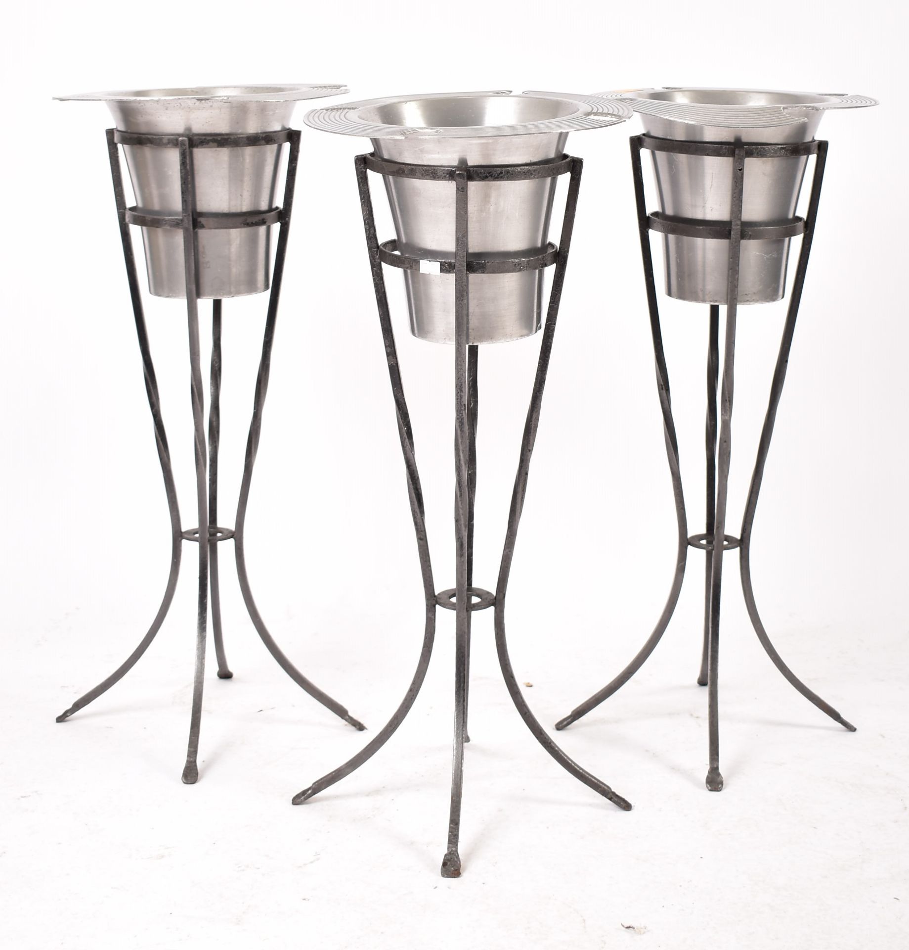 THREE CHROME & CAST IRON CHAMPAGNE BUCKETS & STANDS