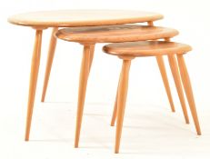 ERCOL - MODEL 354 - MID CENTURY BEECH AND ELM NEST OF TABLES