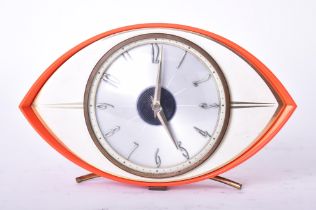 METAMEC - MID CENTURY ORANGE BAKELITE ATOMIC EYE DESK CLOCK