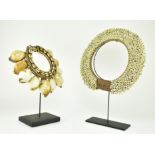TWO ROCHE BOBOIS NATURAL SHELL NECKLACE ON STAND